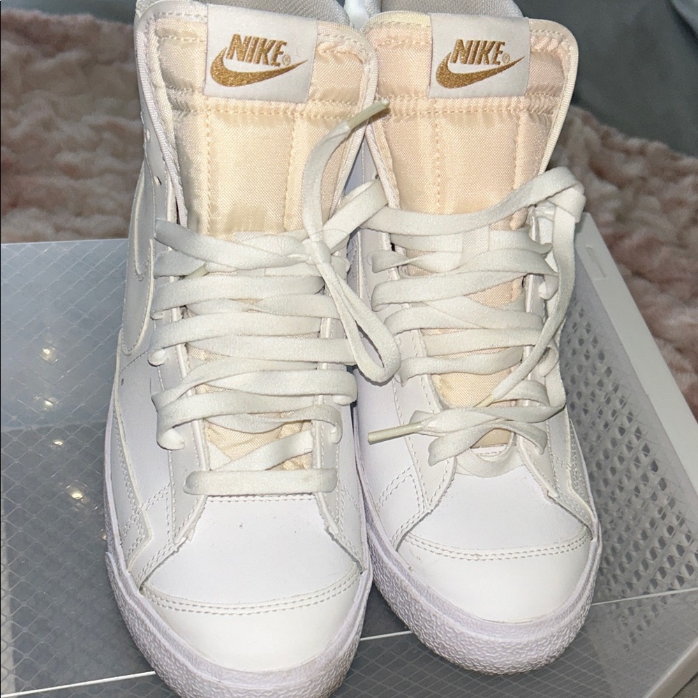 Nike Women’s High-Top Sneakers in White and Cream with Gold Logo
